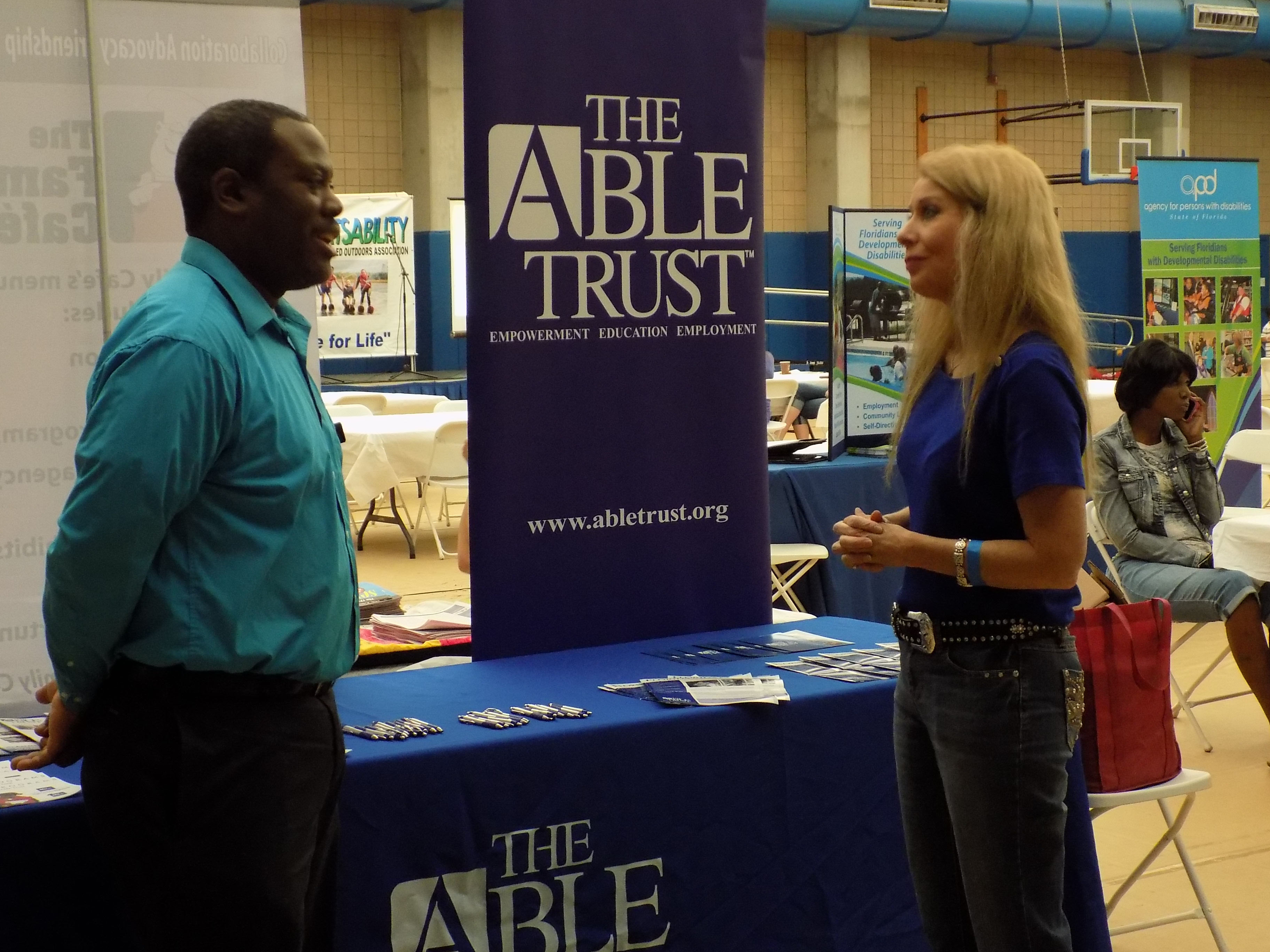 APD Communications Director Melanie Etters visits Ray Ford of The Able Trust.